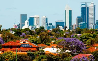 Perth suburb with skyscrapers seen on the background.